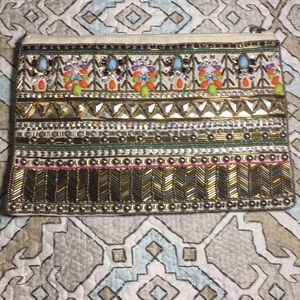 Beaded canvas zipper clutch.